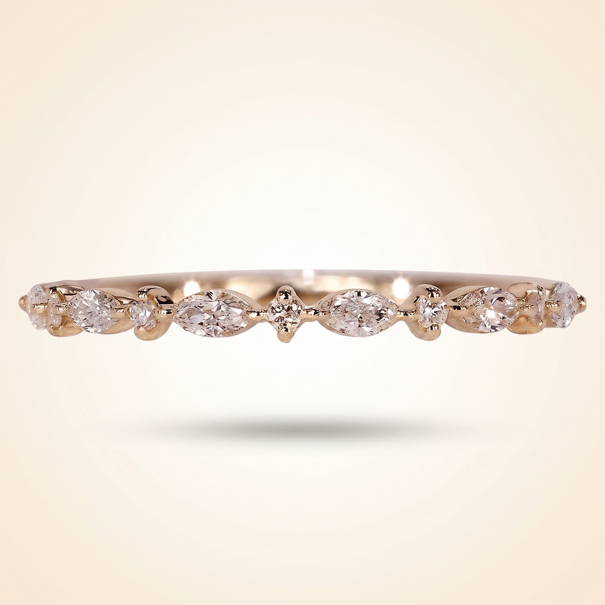 alternating marquise and round half eternity diamond band