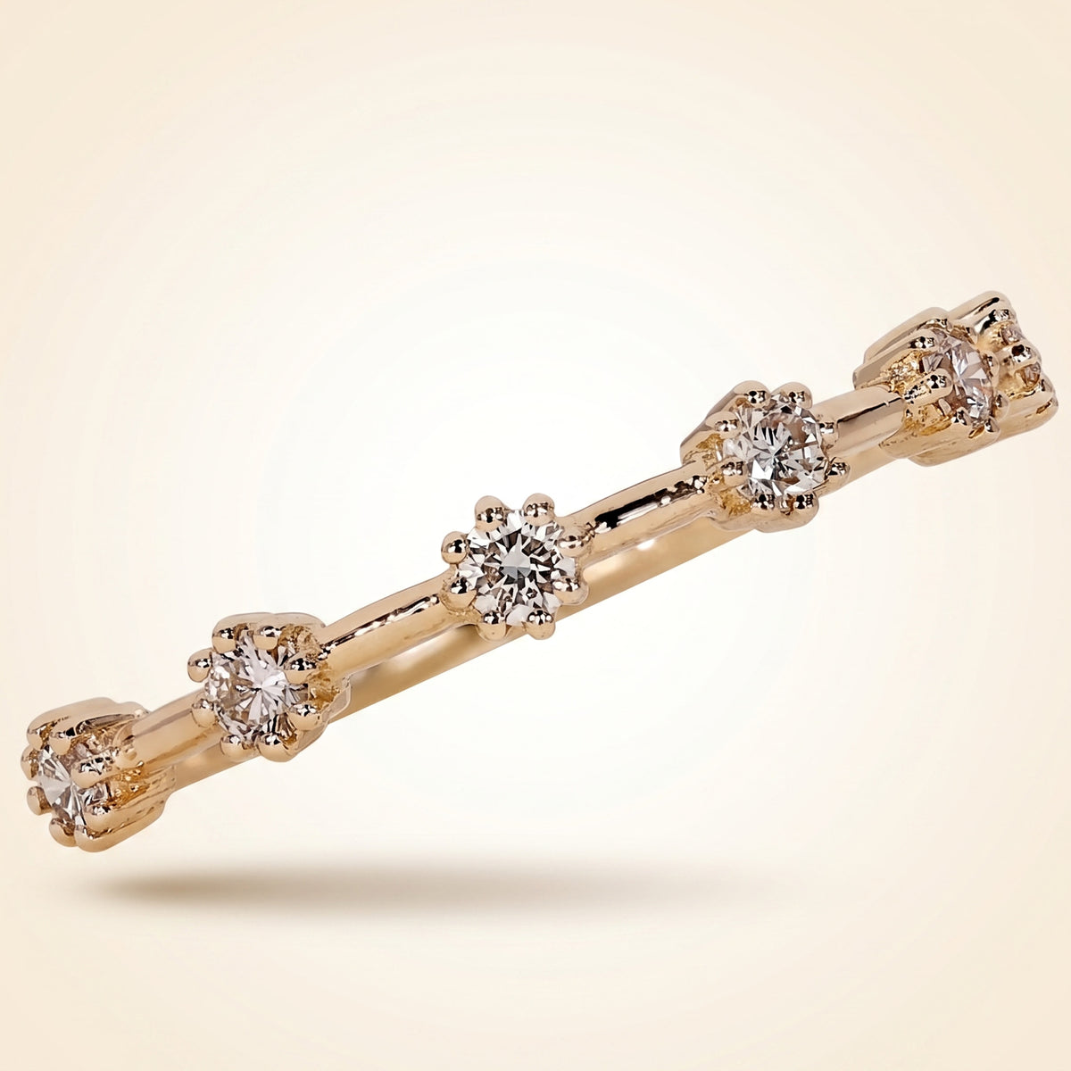 half-eternity station spaced diamond wedding band