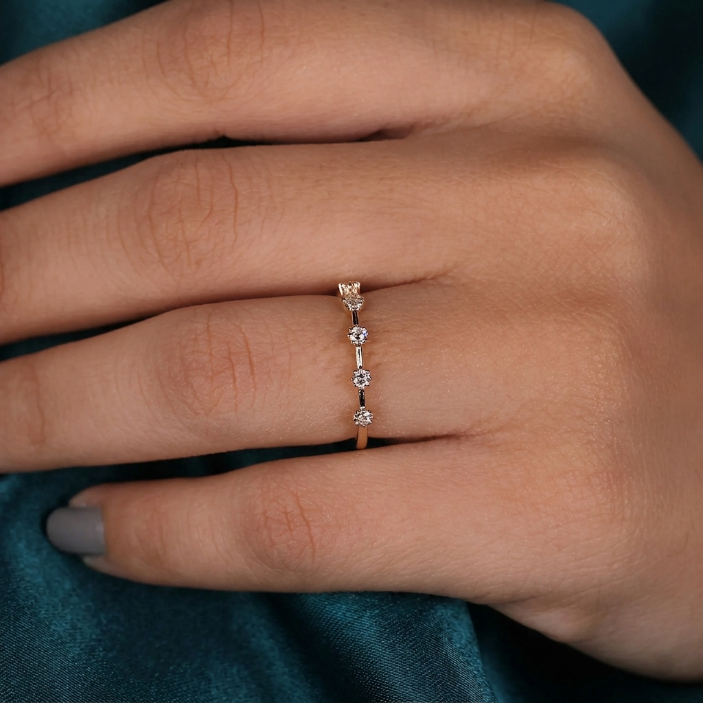 half-eternity station spaced diamond wedding band
