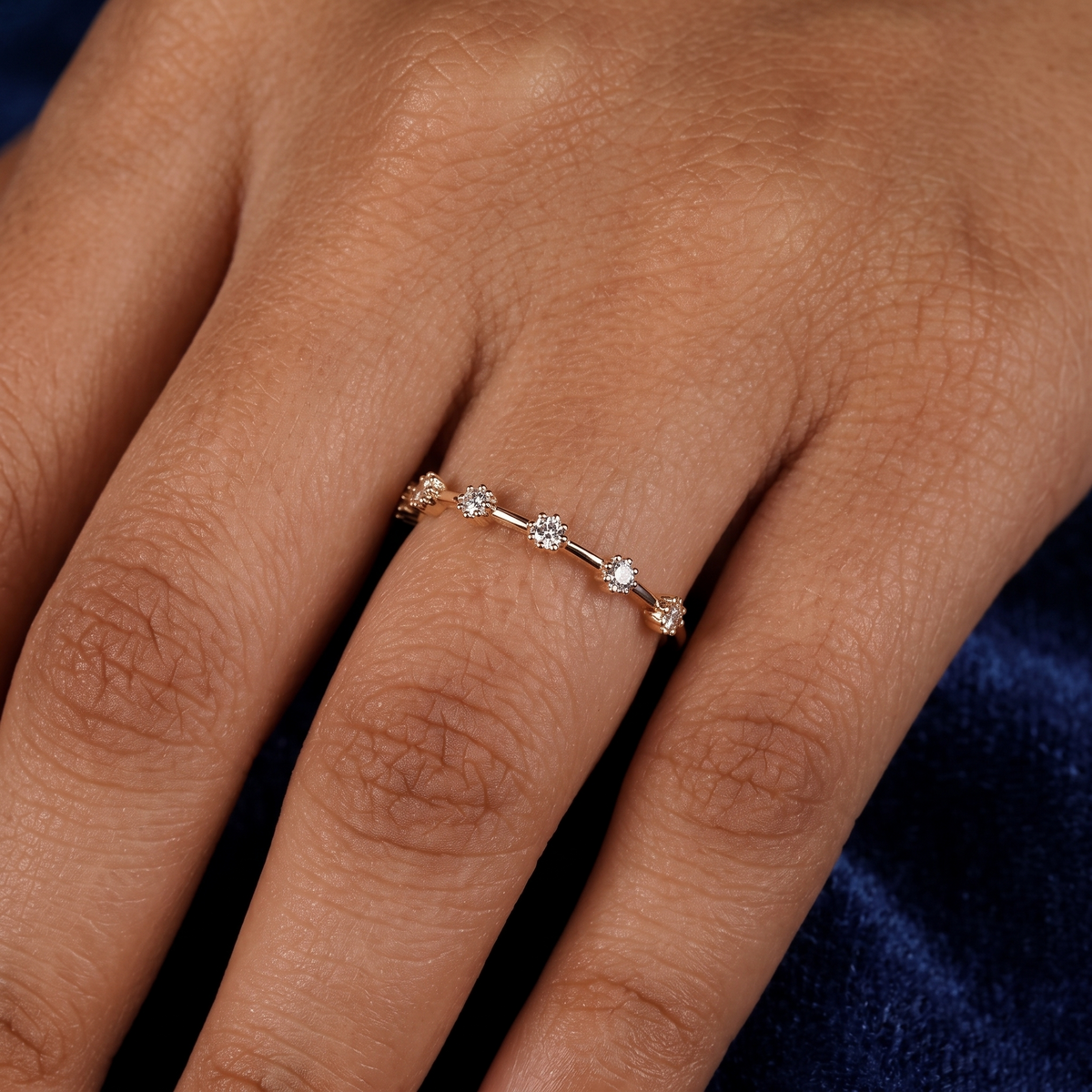 half-eternity station spaced diamond wedding band