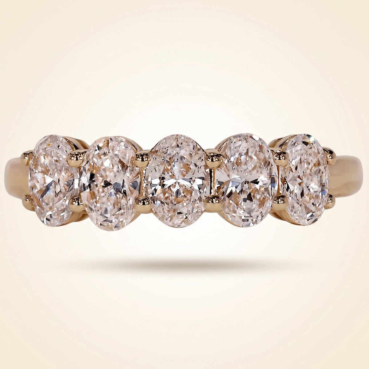 five-stone oval cut wedding band