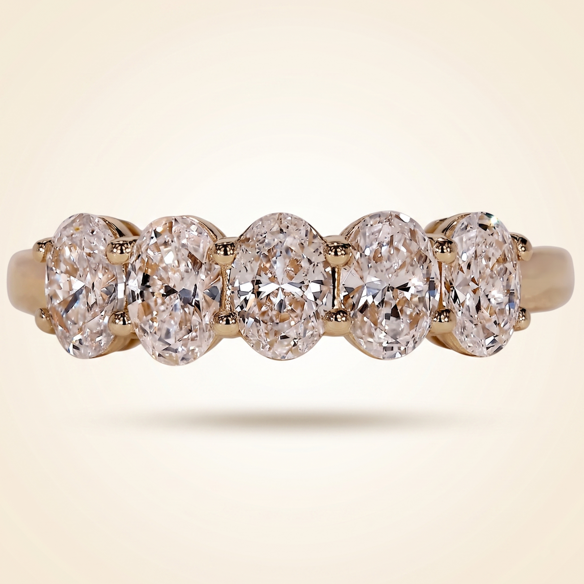 five-stone oval cut wedding band