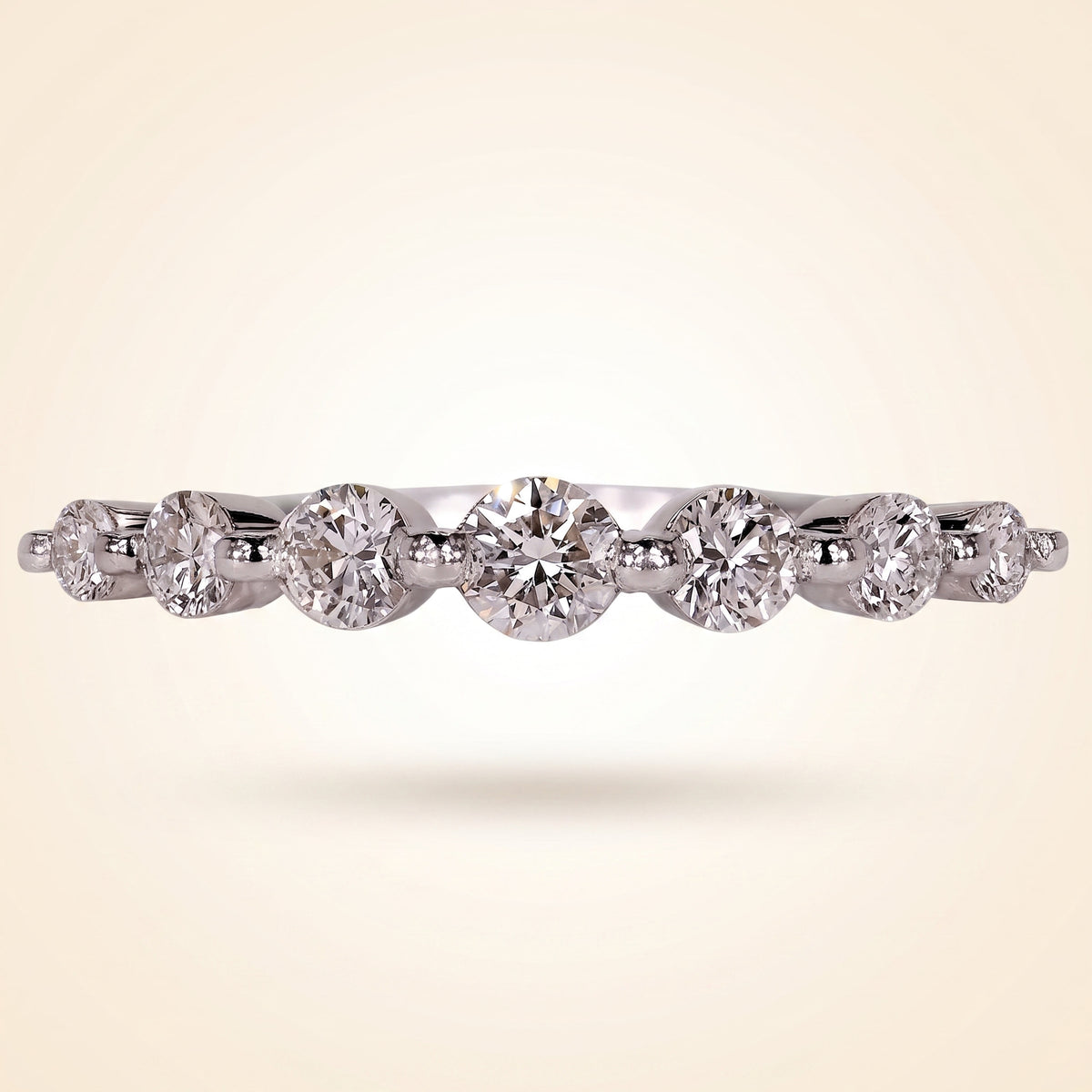 seven-stone half eternity round cut diamond band
