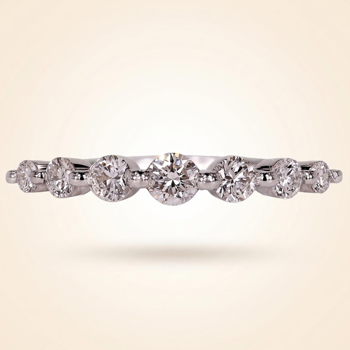 seven-stone half eternity round cut diamond band