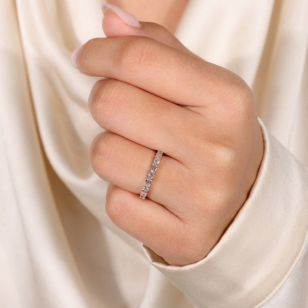 alternating emerald and round cut wedding band