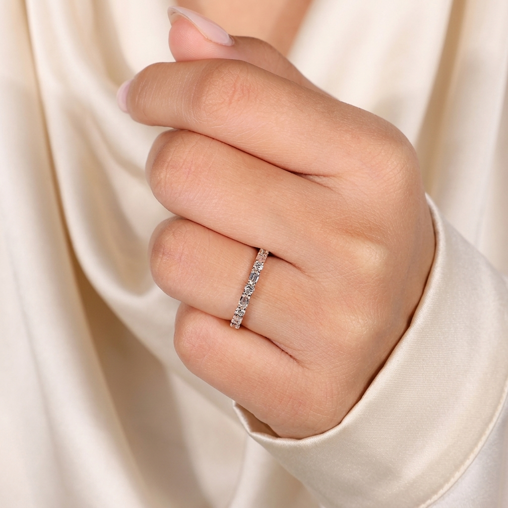 alternating emerald and round cut wedding band