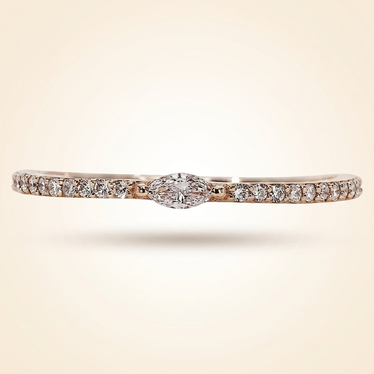 east-west marquise center pave diamond band