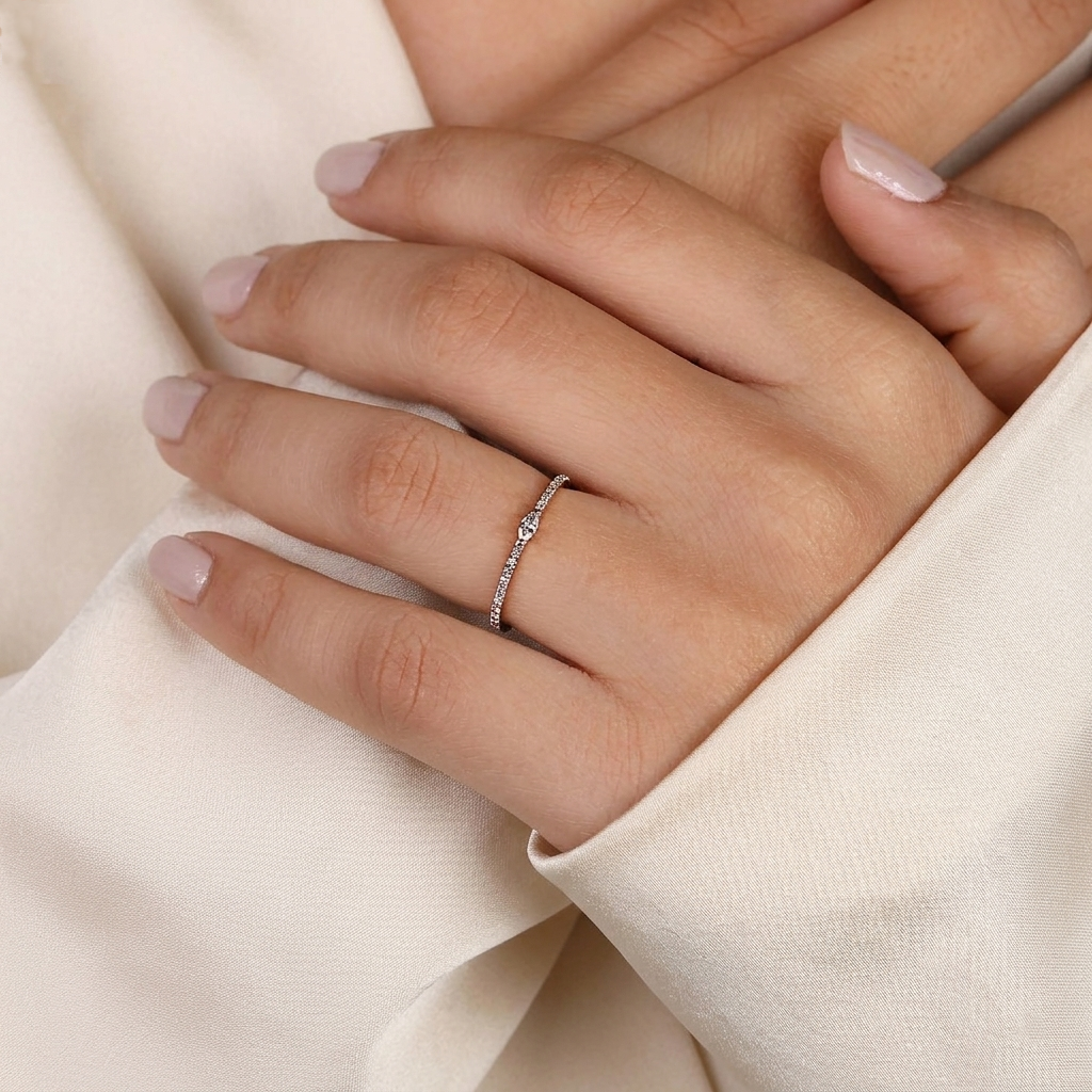 east-west marquise center pave diamond band