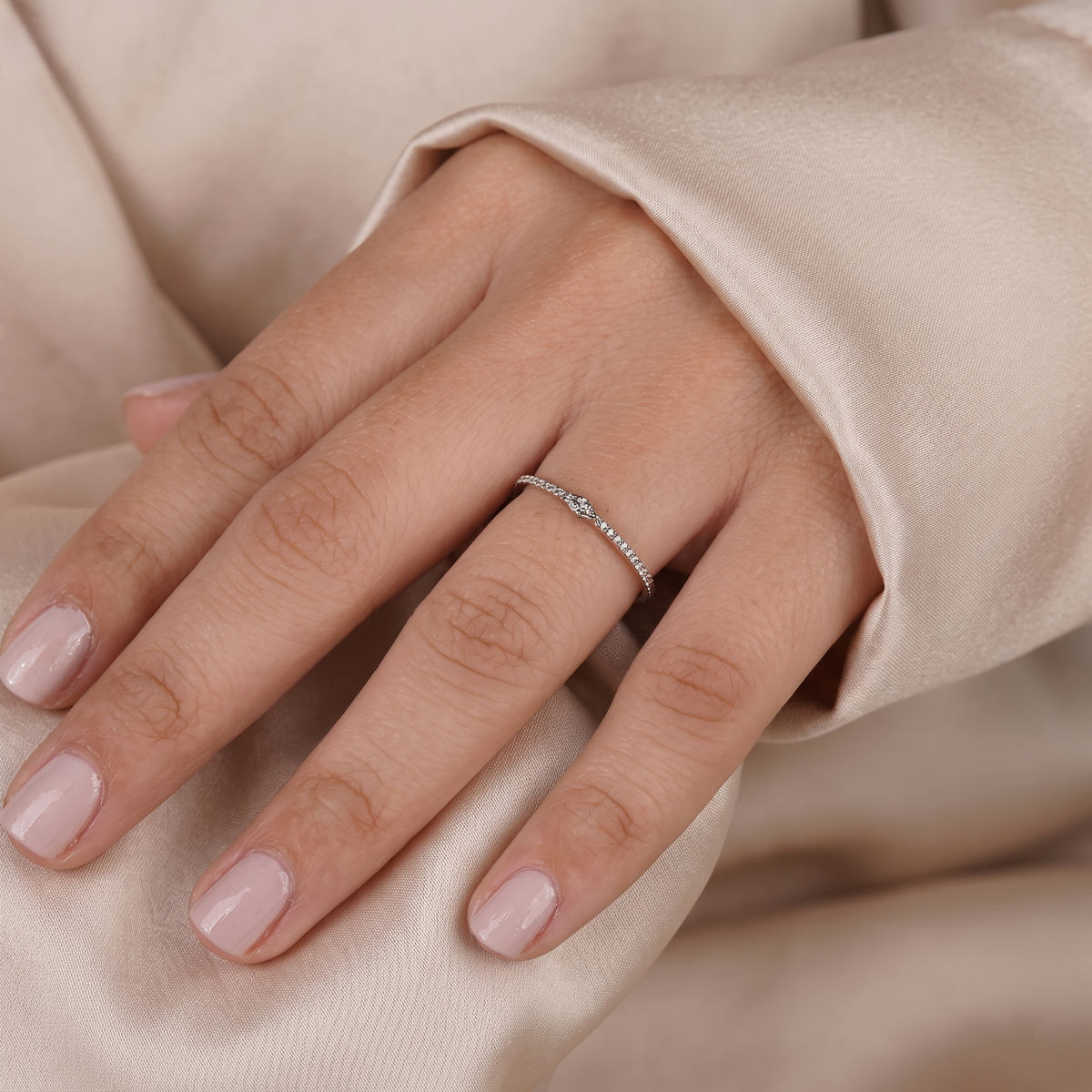 east-west marquise center pave diamond band