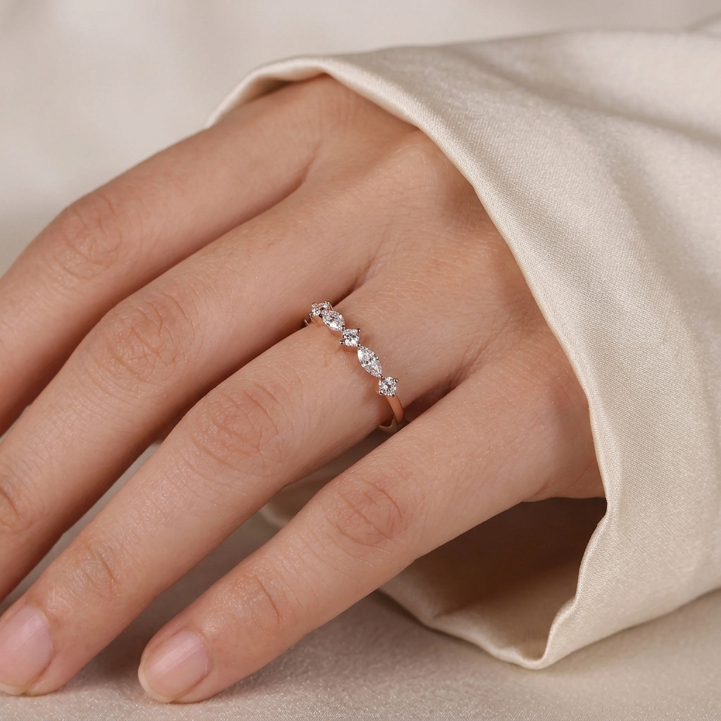 alternating east-west marquise and round diamond band