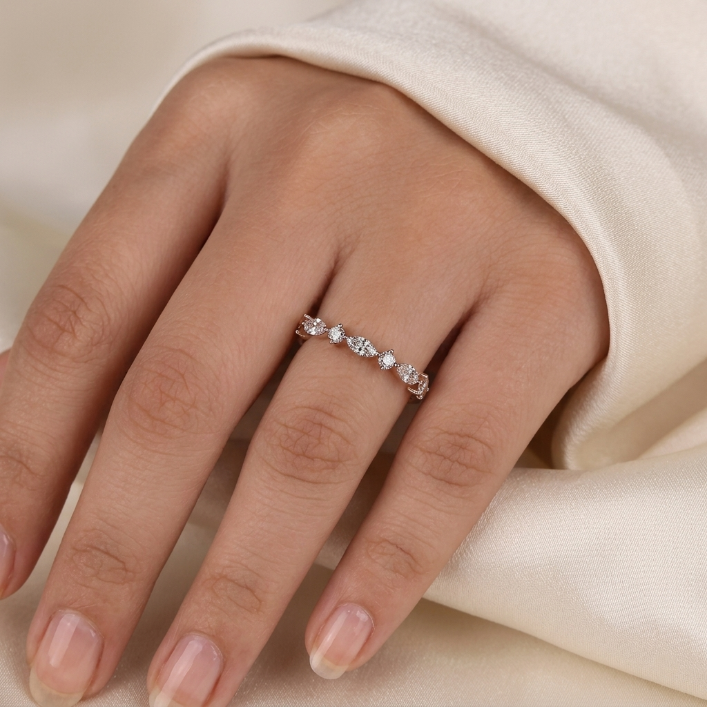 alternating east-west marquise and round diamond band