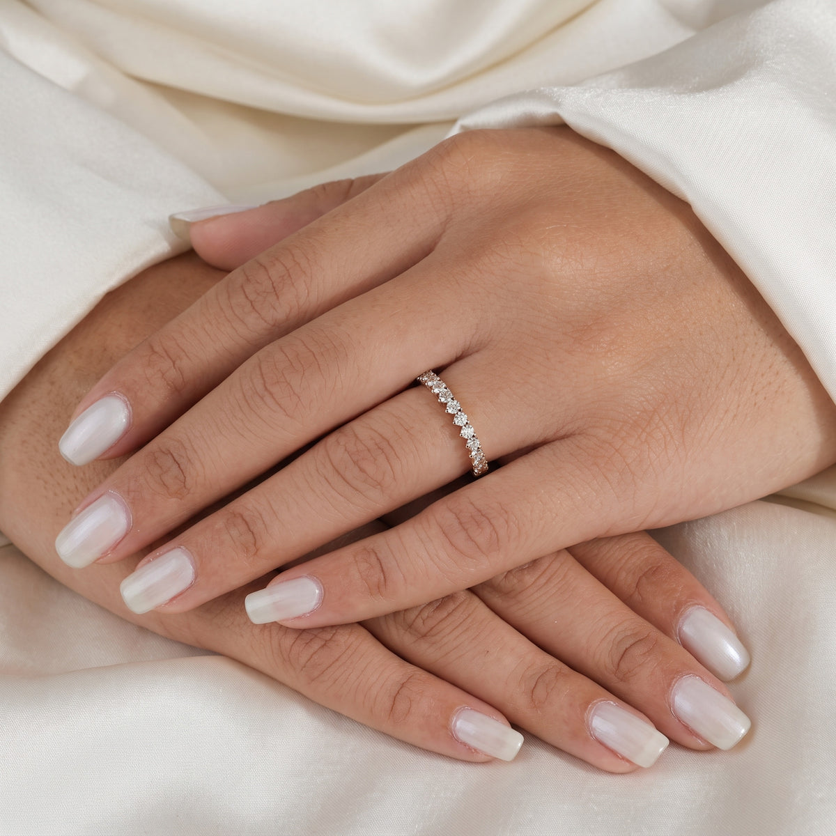 graduated round cut diamond half-eternity band