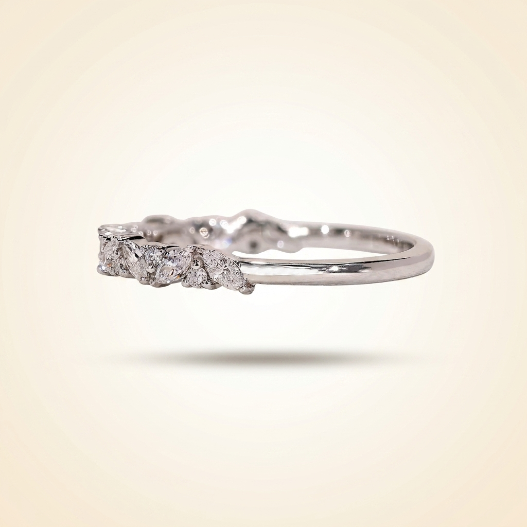 alternating marquise and round half eternity diamond band