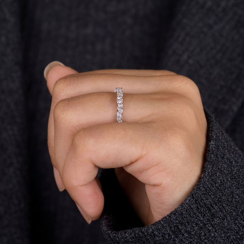 alternating marquise and round half eternity diamond band
