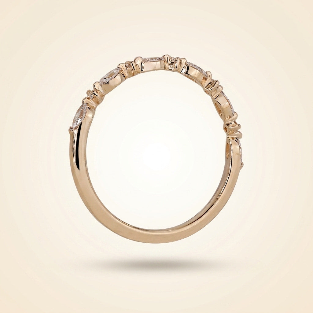 alternating marquise and round half eternity diamond band