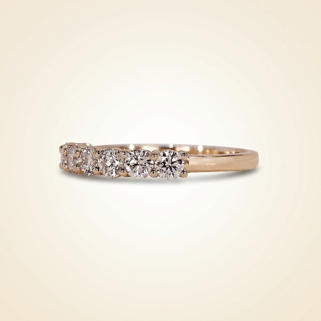 seven-stone half-eternity shared-prong diamond wedding band