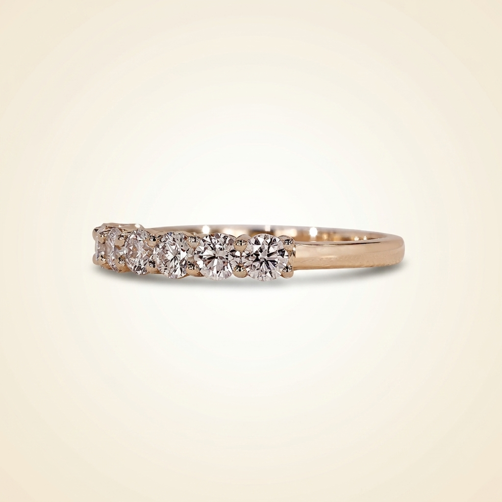 seven-stone half-eternity shared-prong diamond wedding band