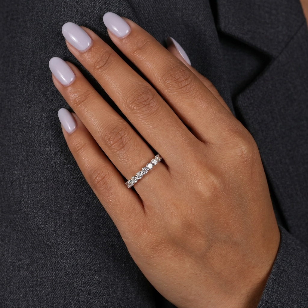 seven-stone half-eternity shared-prong diamond wedding band