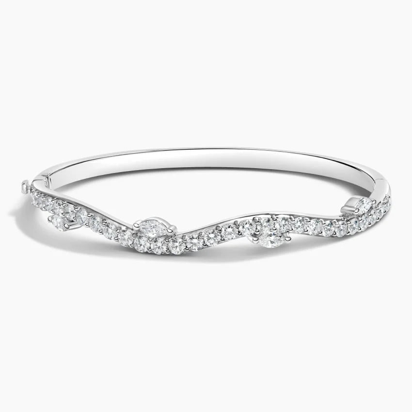 wavy pavé diamond hinged bangle with marquise accents