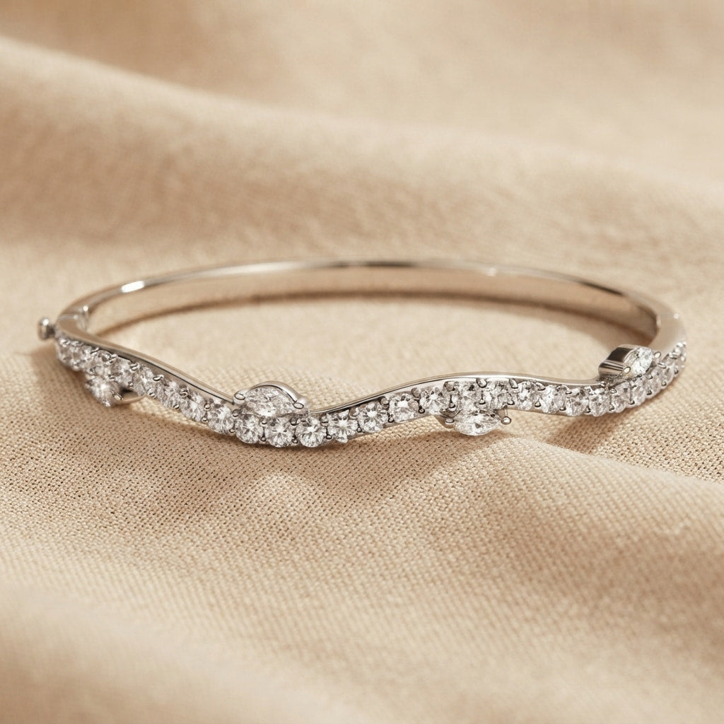 wavy pavé diamond hinged bangle with marquise accents