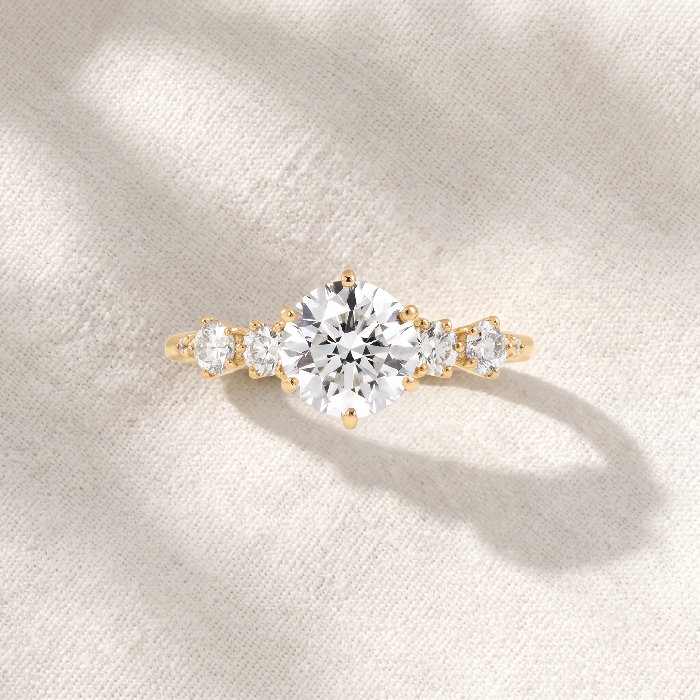 round lab grown diamond side stone engagement ring