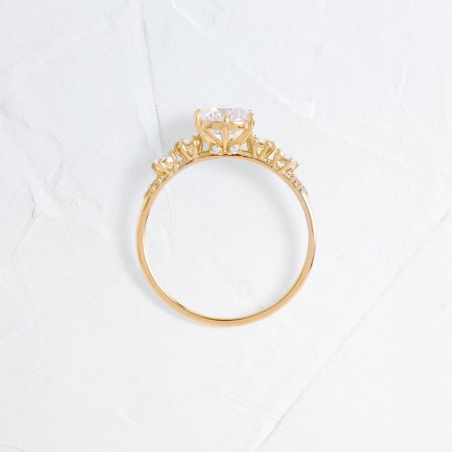 round lab grown diamond side stone engagement ring