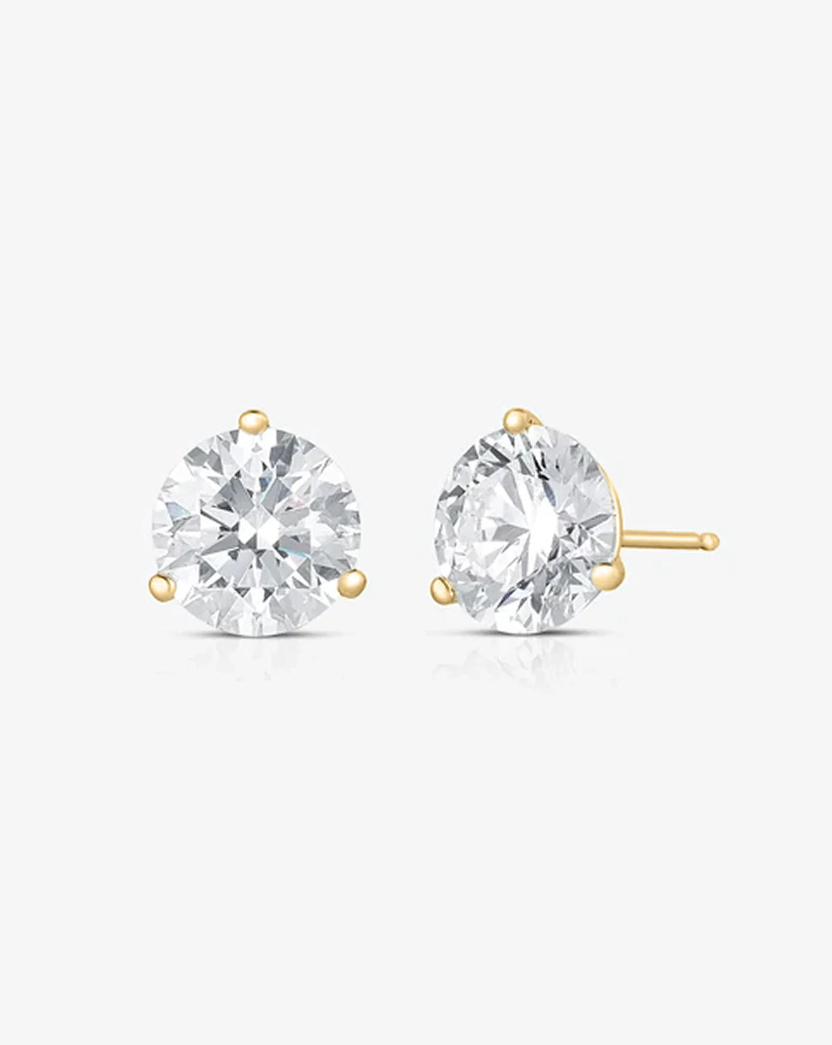 gold three-prong round diamond martini stud earrings