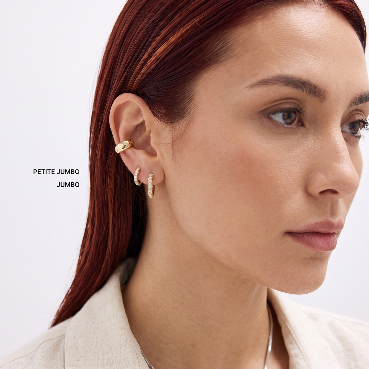 shared-prong round diamond huggie hoop earrings