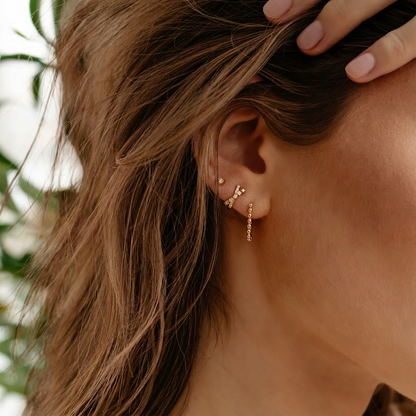 Gold Crisscross Diamond Huggie Hoop Earrings with X Motif