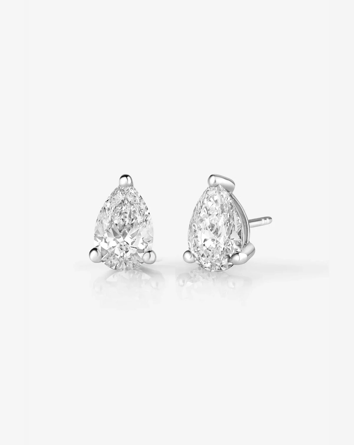three-prong pear cut diamond stud earrings