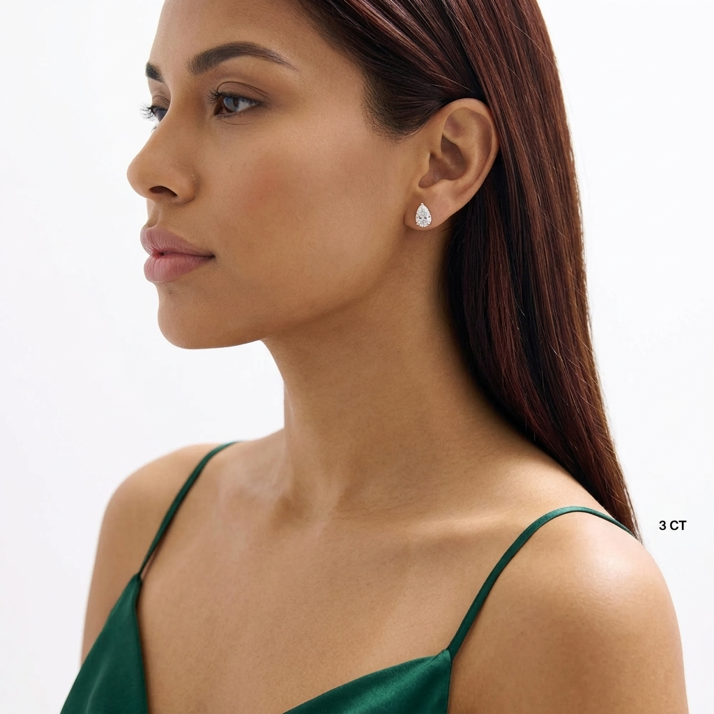 three-prong pear cut diamond stud earrings
