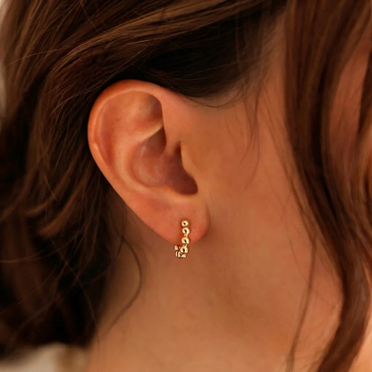 Gold Beaded Huggie Hoop Earrings with Polished Sphere Details