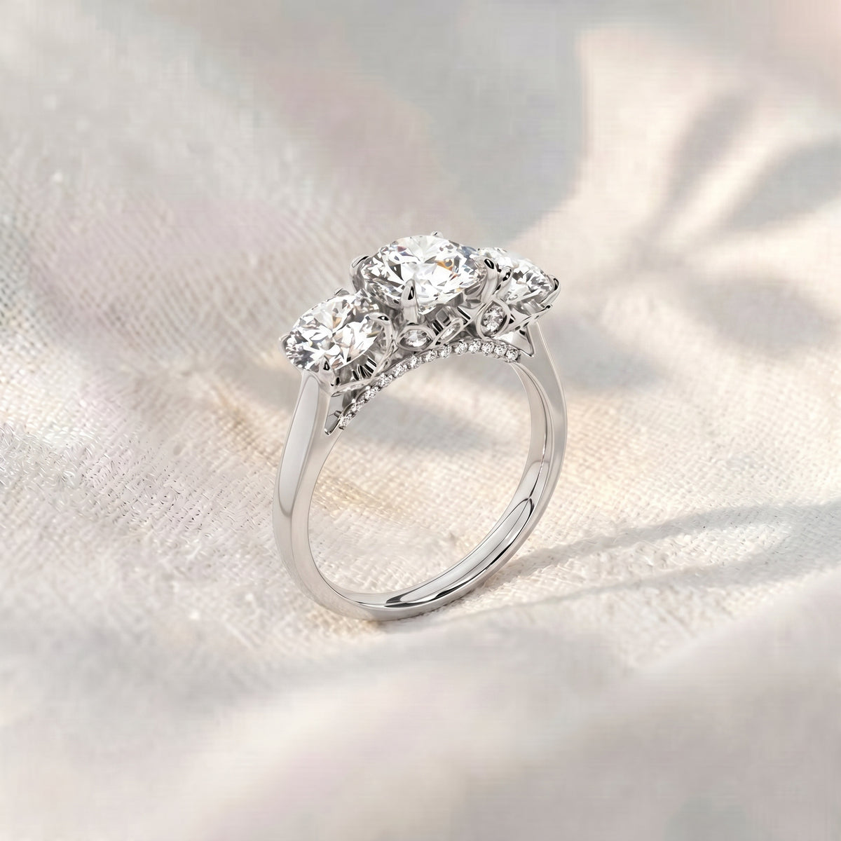 round lab grown diamond three stone engagement ring