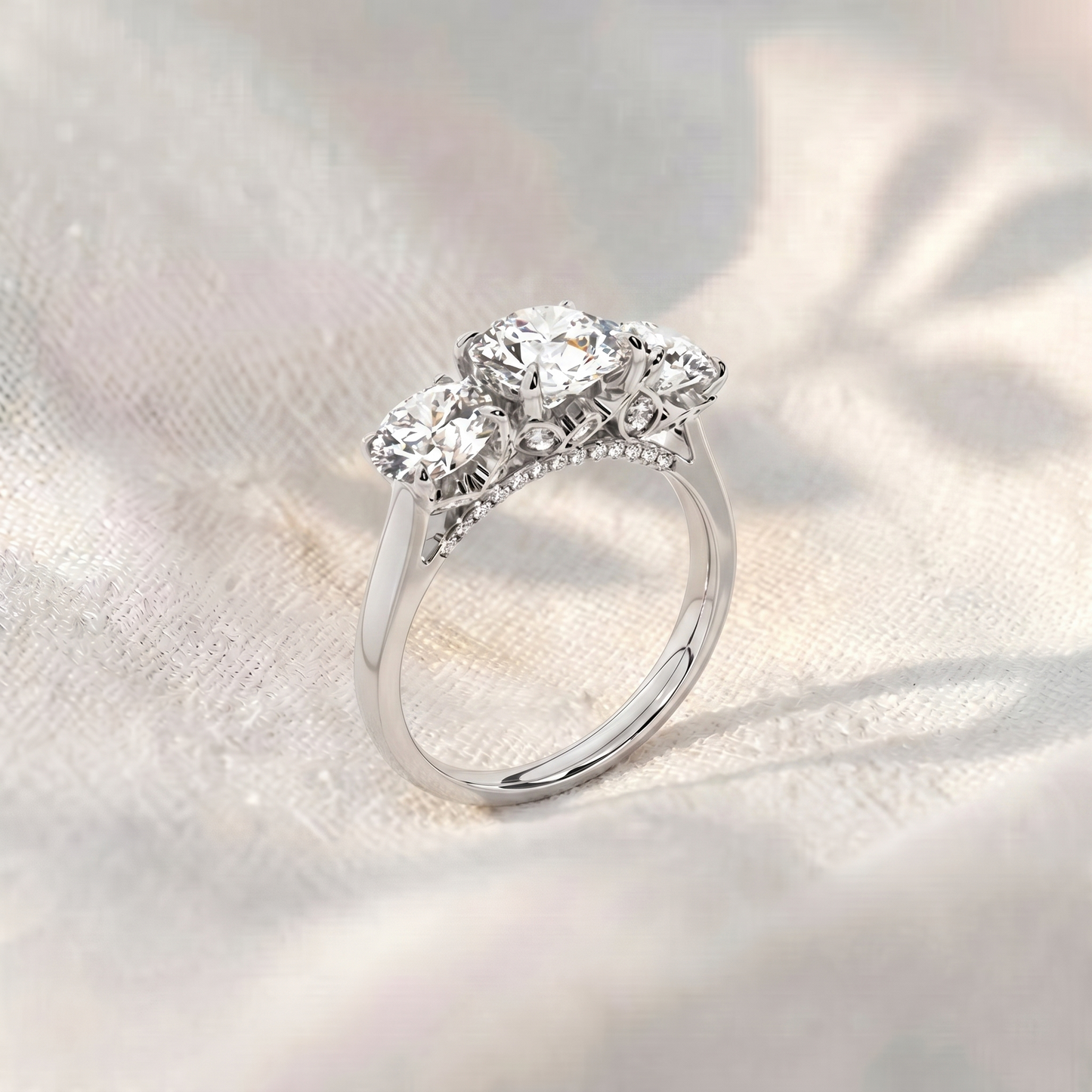 round lab grown diamond three stone engagement ring