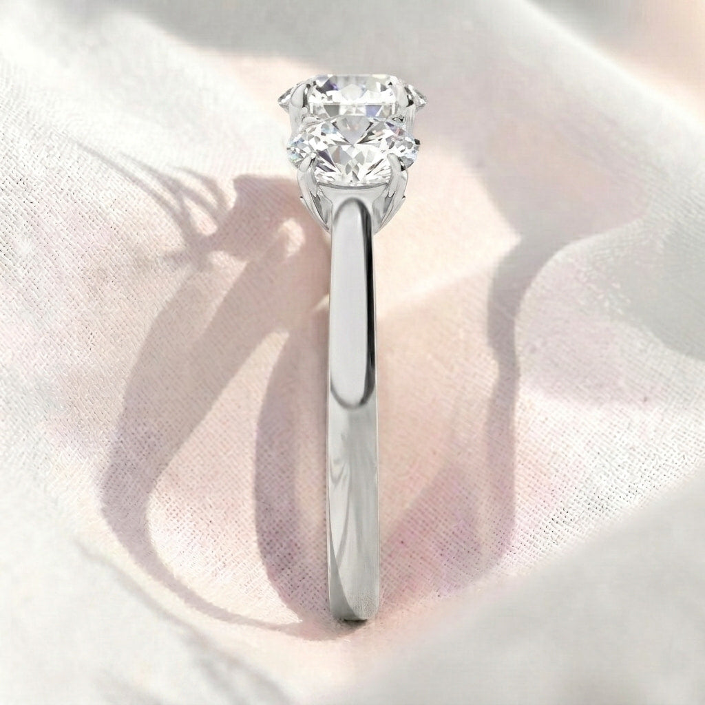 round lab grown diamond three stone engagement ring