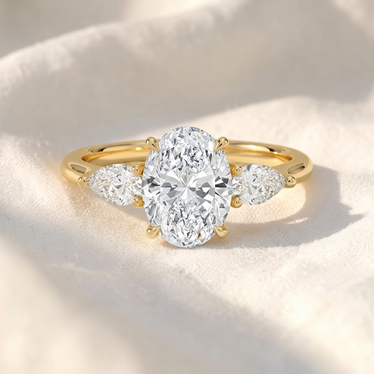 Oval Lab Grown Diamond Three Stone Engagement Ring with Pear Side Stones