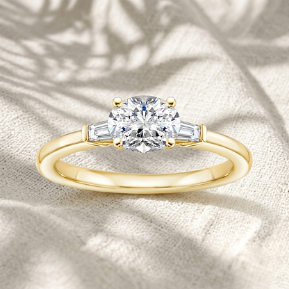 Oval Lab Grown Diamond Three Stone Engagement Ring with Tapered Baguette Side Stones
