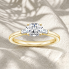 Oval Lab Grown Diamond Three Stone Engagement Ring with Tapered Baguette Side Stones