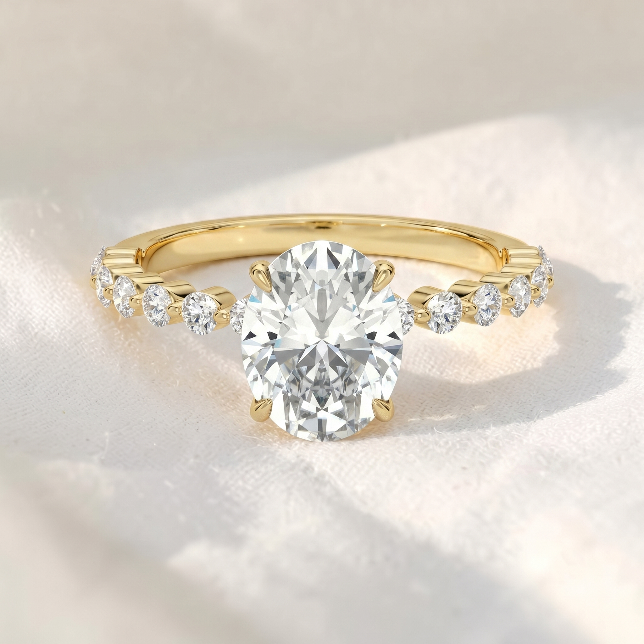 Oval Lab Grown Diamond Hidden Halo Engagement Ring with Shared Prong Pavé Band