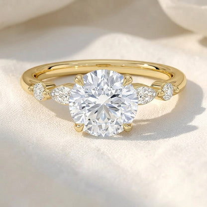 Round Cut Lab Grown Diamond Marquise & Round Side Stone Engagement Ring