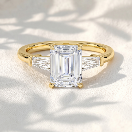 Emerald Cut Lab Grown Diamond Three Stone Engagement Ring with Tapered Baguette Side Stones