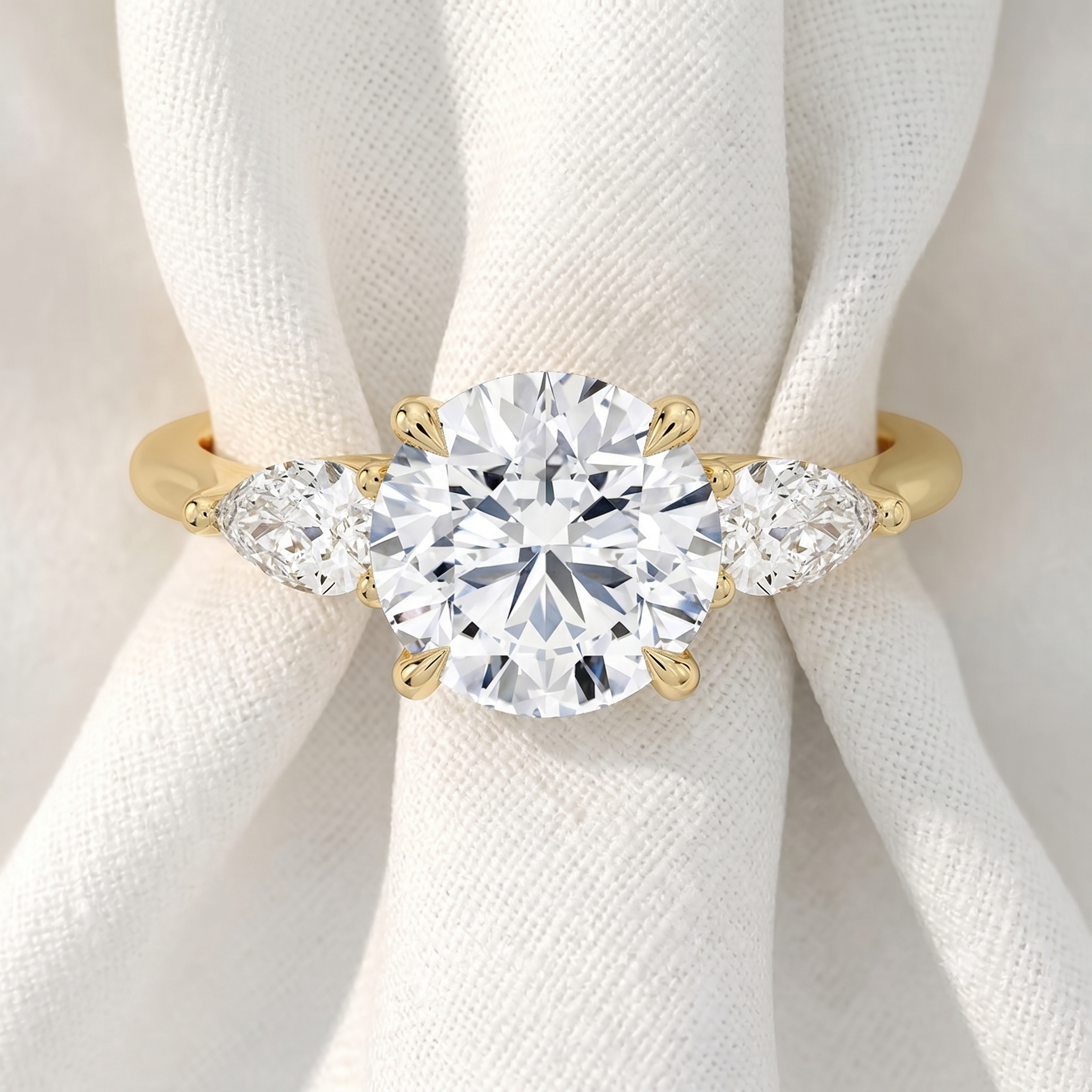 Round Lab Grown Diamond Three Stone Engagement Ring with Pear Side Stones