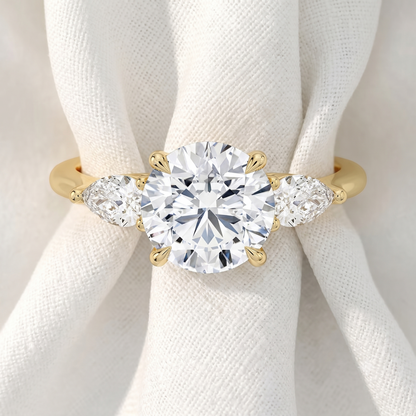 Round Lab Grown Diamond Three Stone Engagement Ring with Pear Side Stones