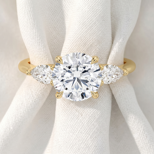 Round Lab Grown Diamond Three Stone Engagement Ring with Pear Side Stones