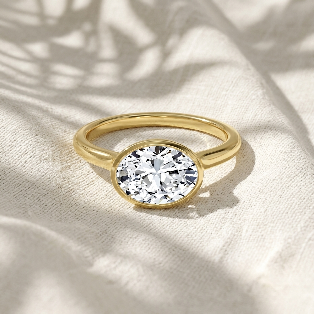 oval cut east-west bezel set lab grown diamond solitaire engagement ring