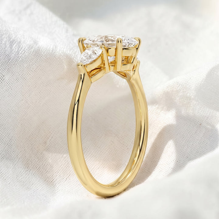 Oval Lab Grown Diamond Three Stone Engagement Ring with Pear Side Stones