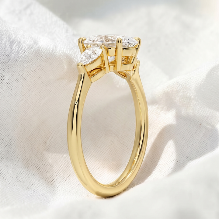 Oval Lab Grown Diamond Three Stone Engagement Ring with Pear Side Stones