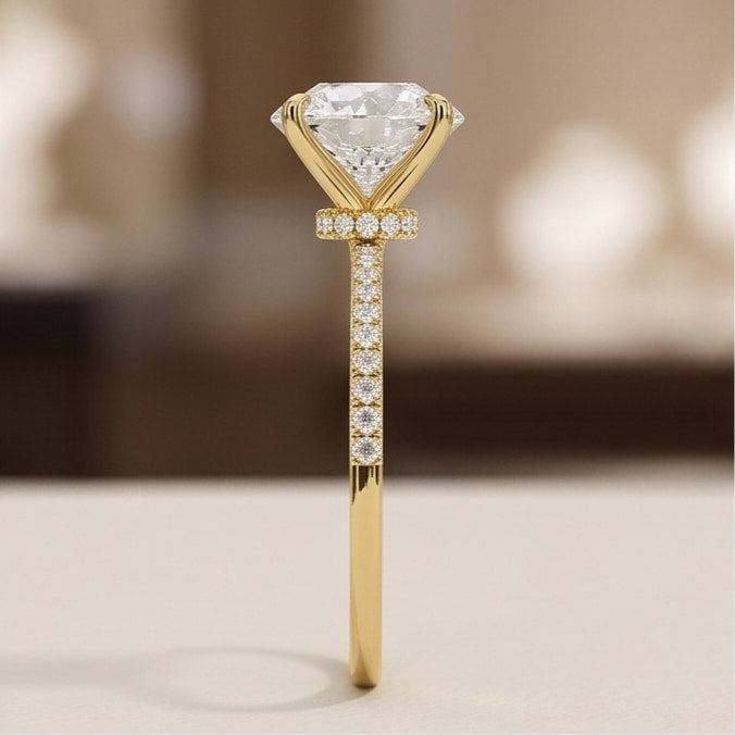 round lab grown diamond pavé engagement ring in gold – four prong solitaire with hidden halo