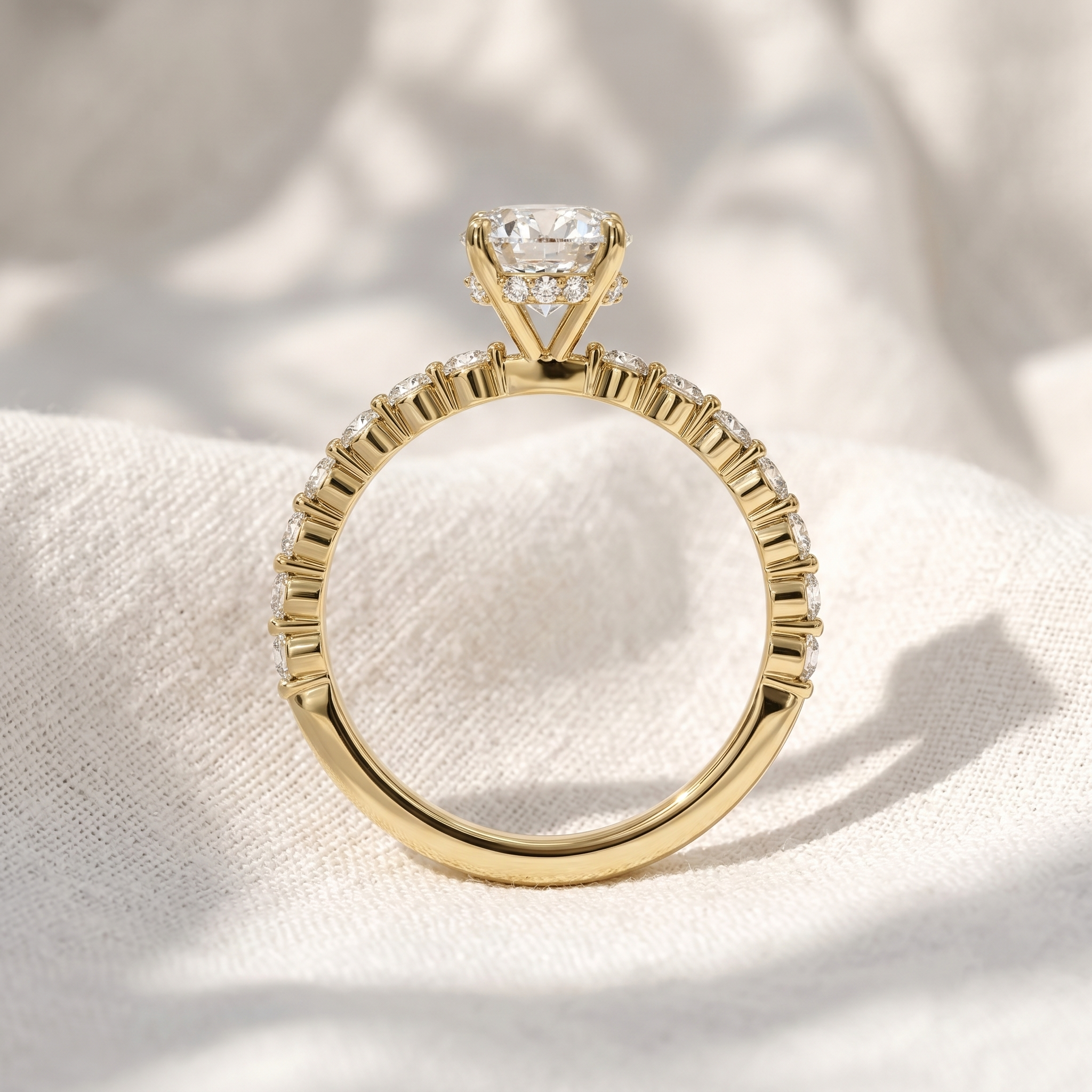 Oval Lab Grown Diamond Hidden Halo Engagement Ring with Shared Prong Pavé Band