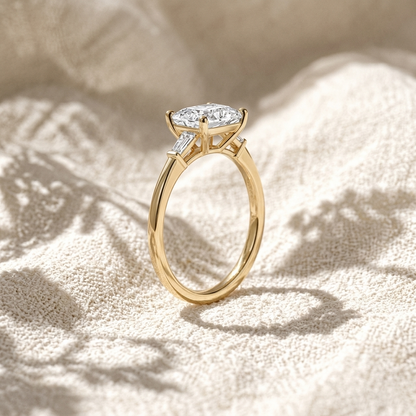 Oval Lab Grown Diamond Three Stone Engagement Ring with Tapered Baguette Side Stones